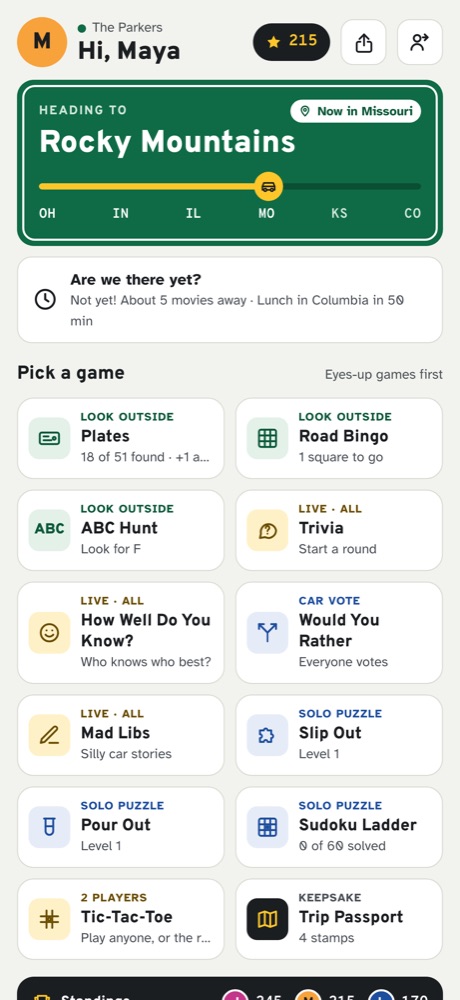 RoadTripKit's home screen for Maya: the trip from Ohio to the Rocky Mountains, now in Missouri, an 'Are we there yet?' card, and a grid of games.